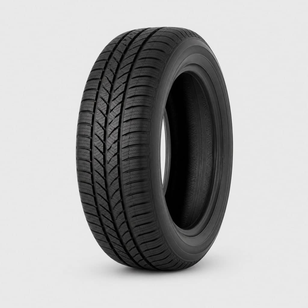 Pneu 4 saisons 205/55 R16 posé debout, marquage du flanc visible